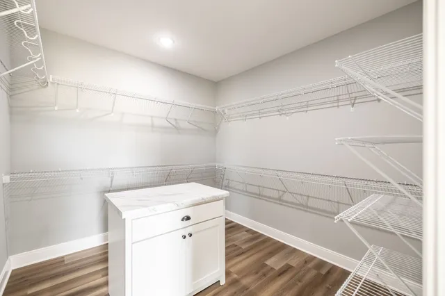 a view of a room with racks on the wall