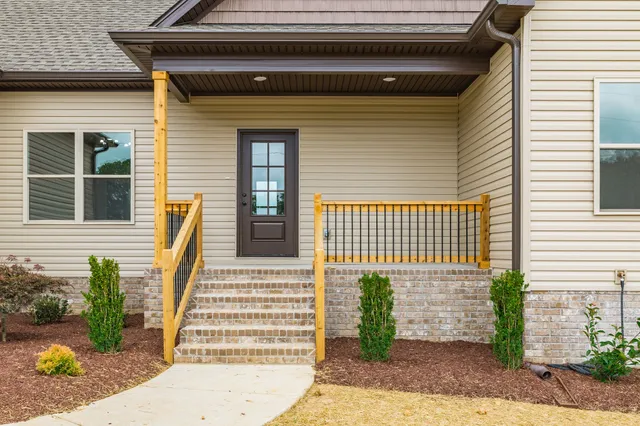 a view of kitchen with wooden floor and window