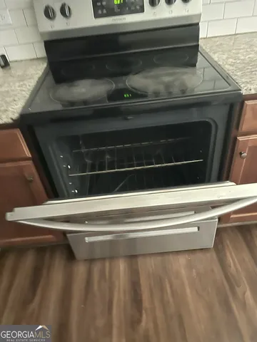 a view of house with front door