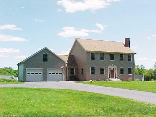 134 Mason Road Brooklyn, CT 06234 - Photo 1 of 1 a view of a house with a big yard plants and large trees