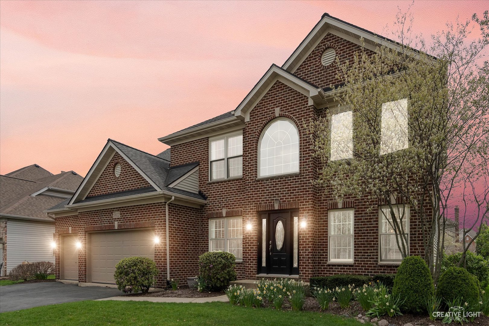 3812 Grassmere Road Naperville, IL 60564 - Photo 1 of 46 front view of house with a yard