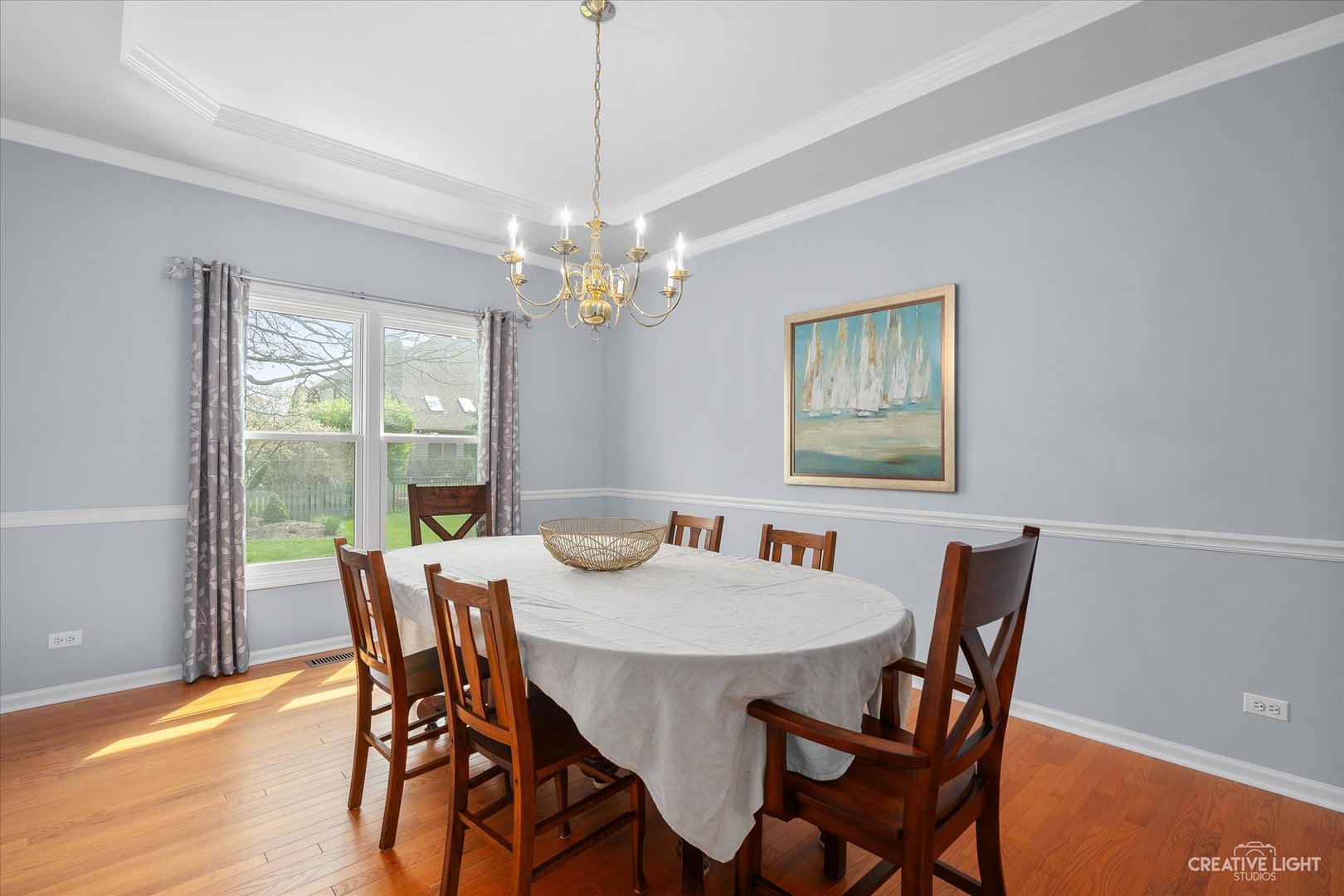 3812 Grassmere Road Naperville, IL 60564 - Photo 12 of 46 a view of a dining room with furniture window and outside view