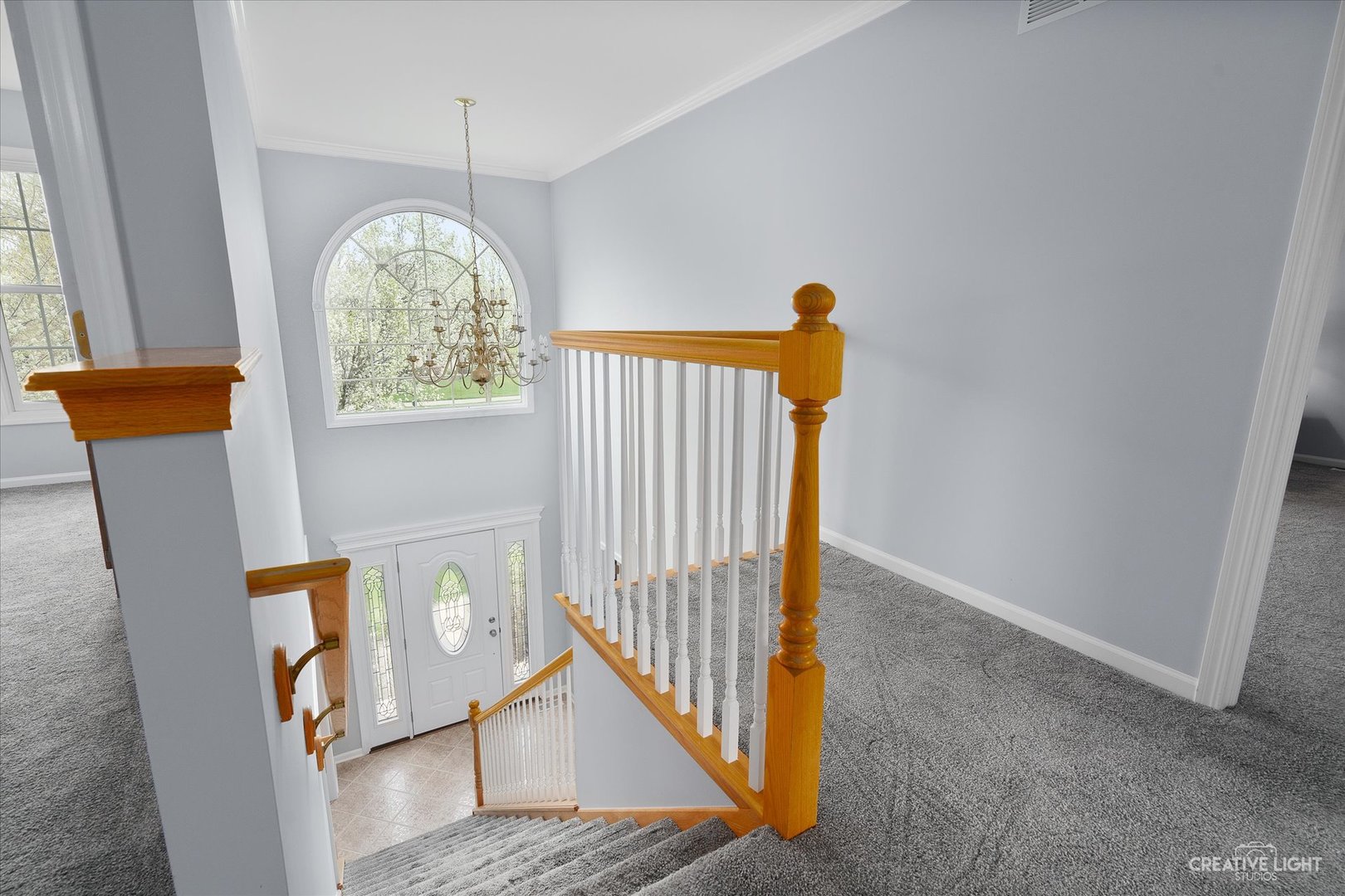 3812 Grassmere Road Naperville, IL 60564 - Photo 18 of 46 a view of an entryway with a chandelier