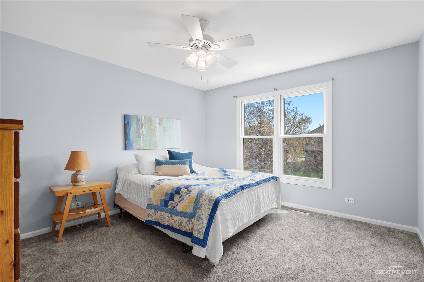 3812 Grassmere Road Naperville, IL 60564 - Photo 22 of 46 a bed room with a bed and a window