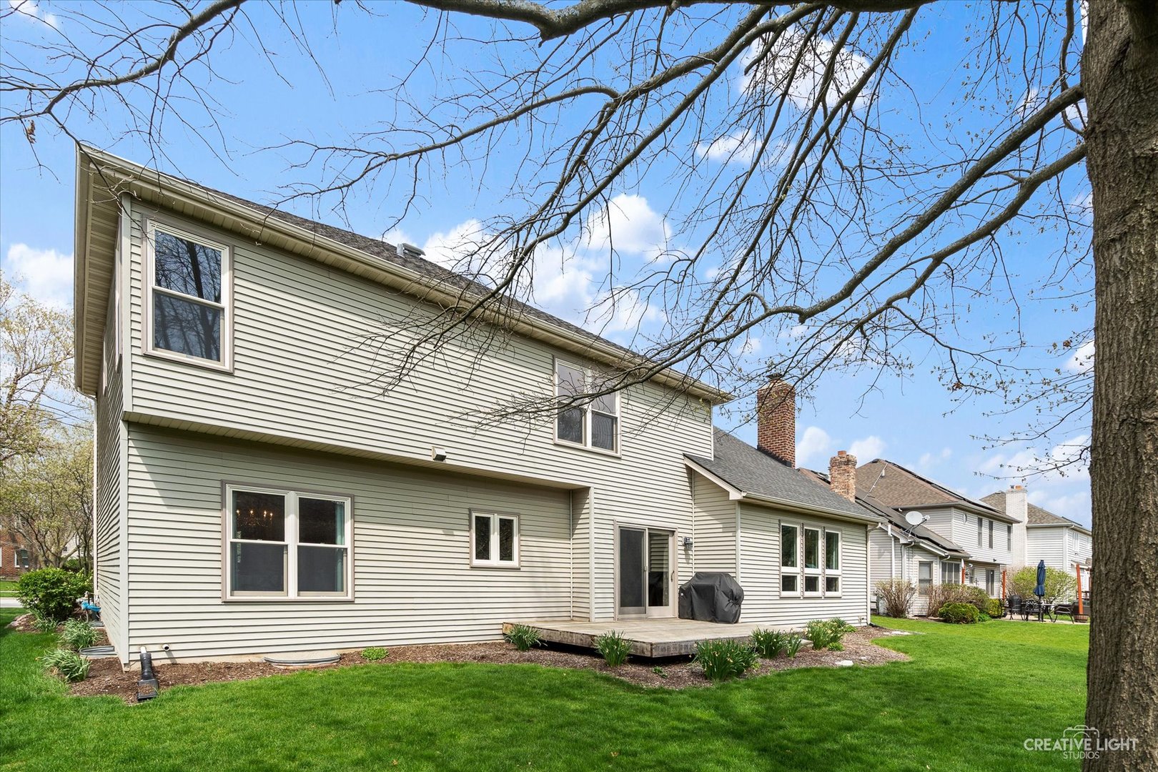 3812 Grassmere Road Naperville, IL 60564 - Photo 26 of 46 a view of white house with a yard