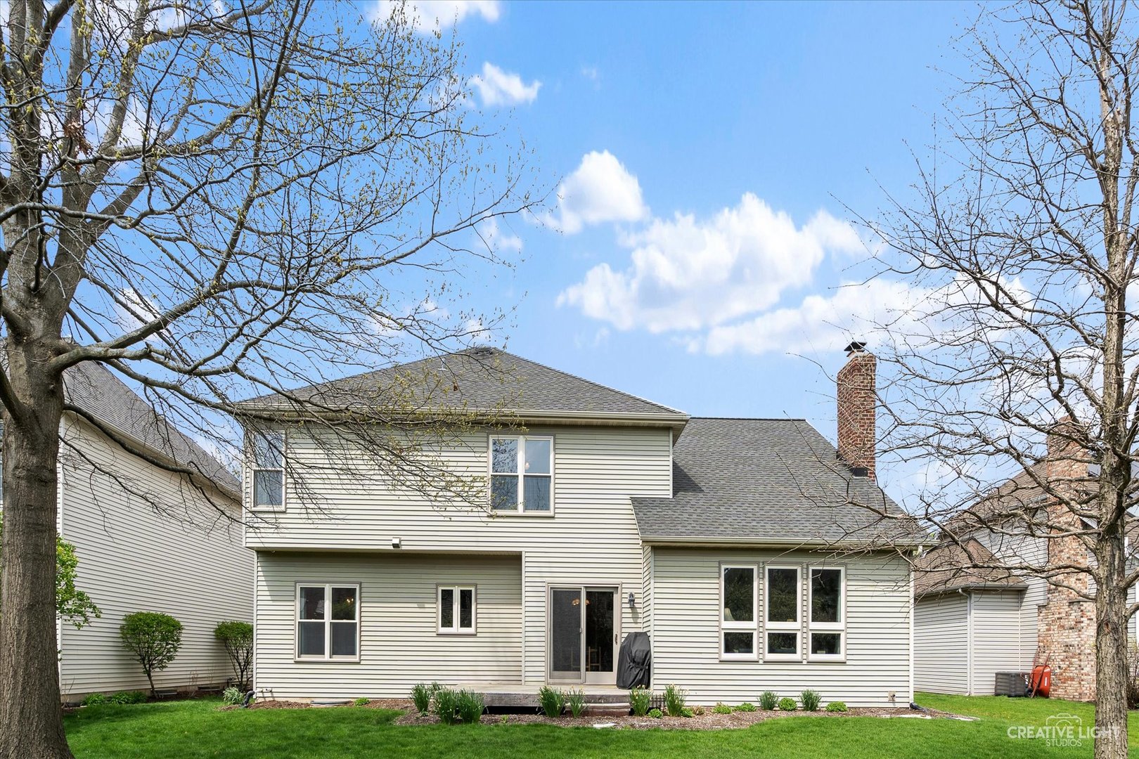 3812 Grassmere Road Naperville, IL 60564 - Photo 27 of 46 a front view of a house with garden