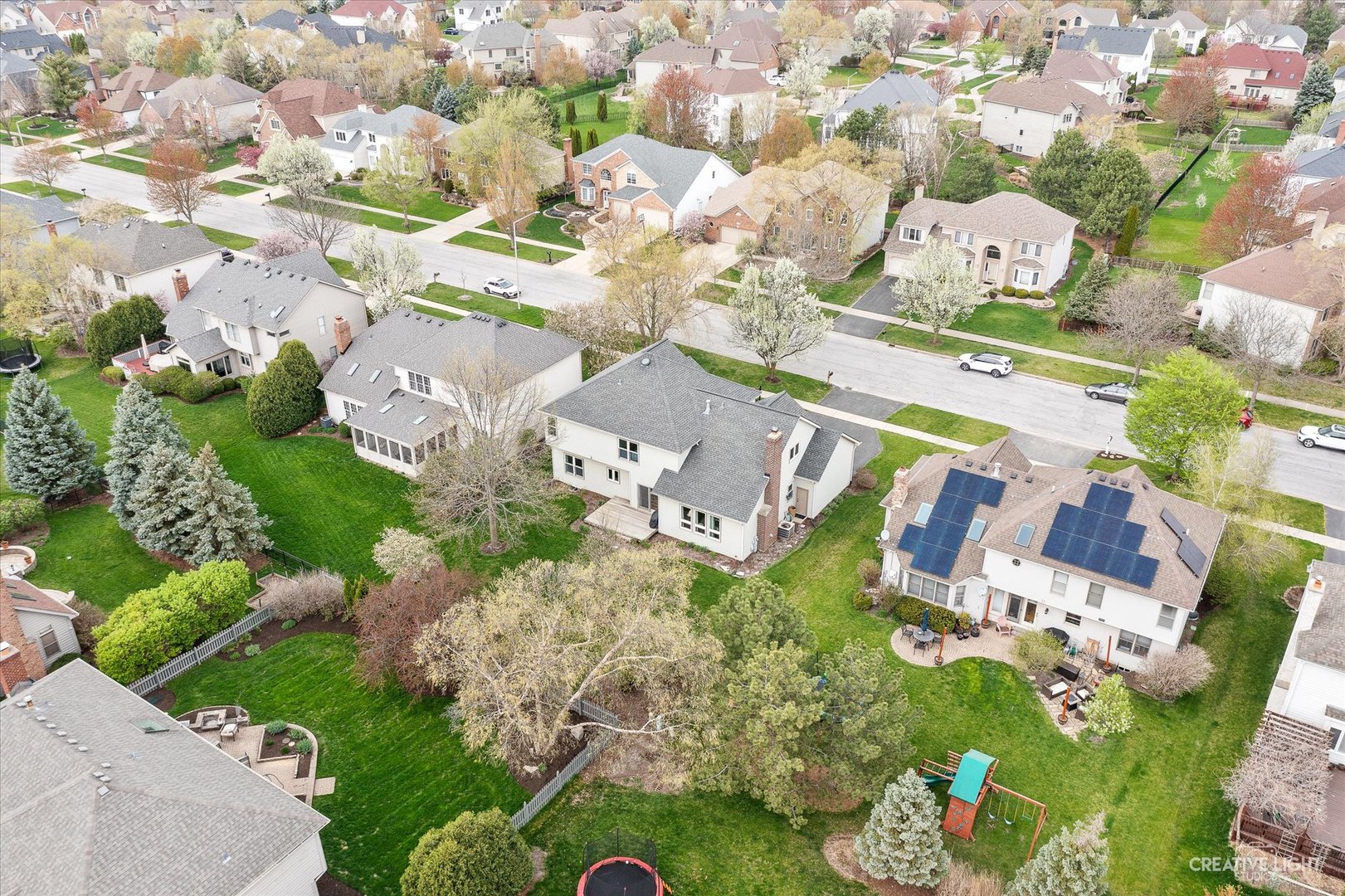 3812 Grassmere Road Naperville, IL 60564 - Photo 31 of 46 an aerial view of a house with yard swimming pool and outdoor seating
