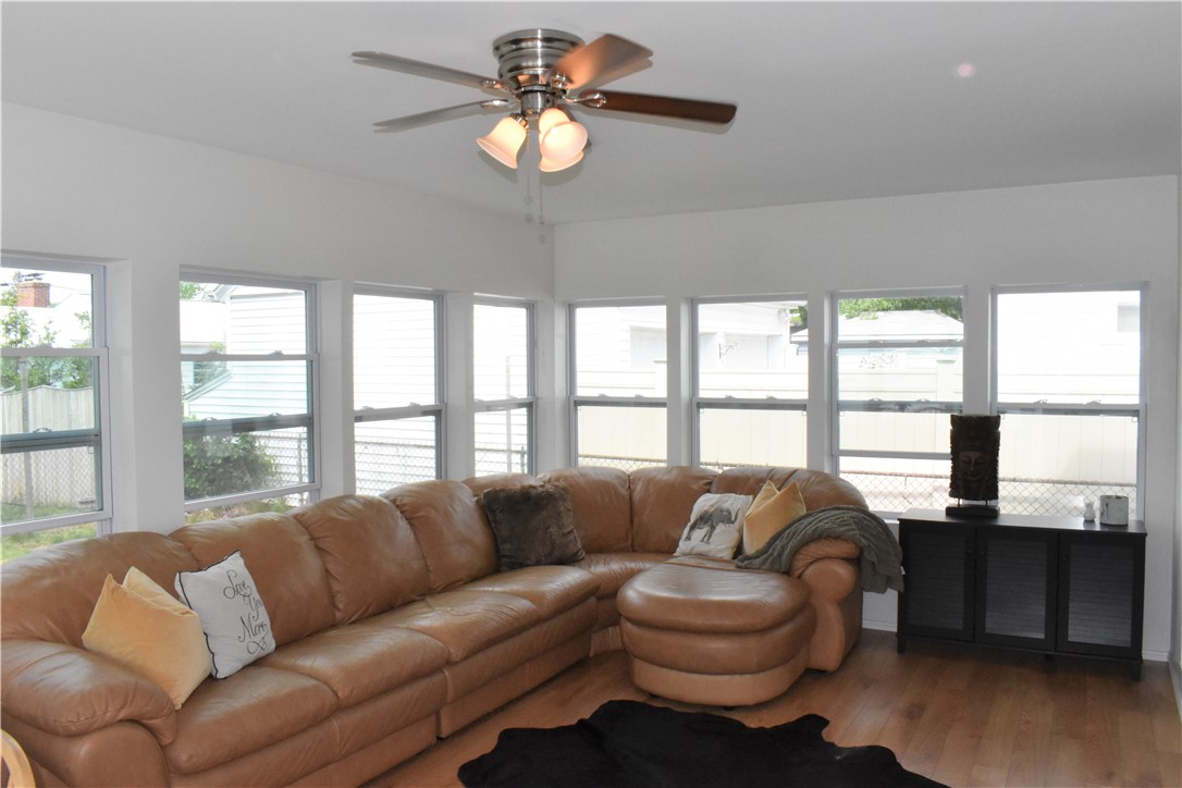 27 Crossway Road Cranston, RI 02910 - Photo 11 of 26 Expansive 3-season sunroom