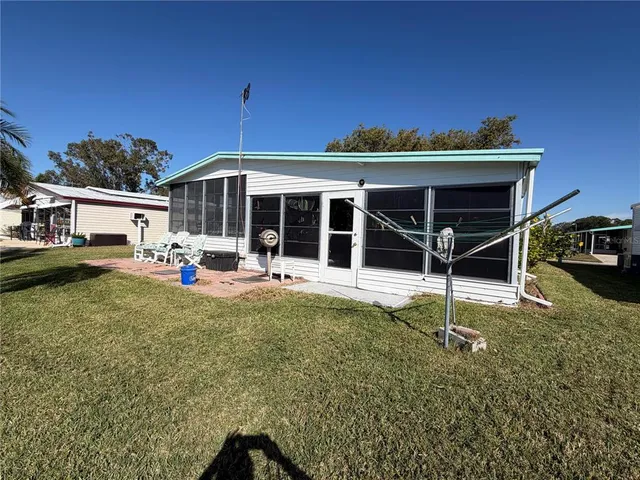 a view of a swimming pool with a patio
