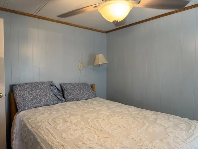 a view of swimming pool with outdoor seating