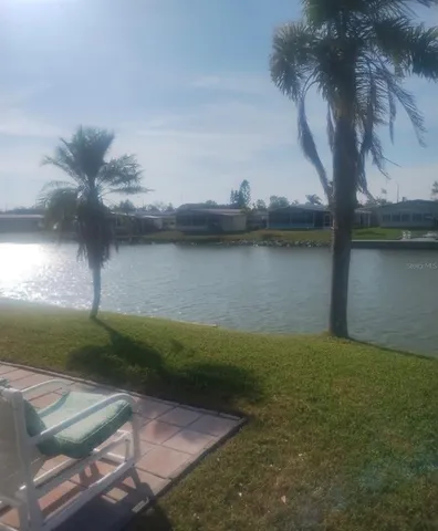 a view of a lake in front of house