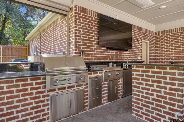 a kitchen view with a sink and a stove