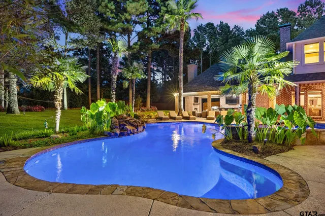 a view of an outdoor space pool patio and outdoor seating