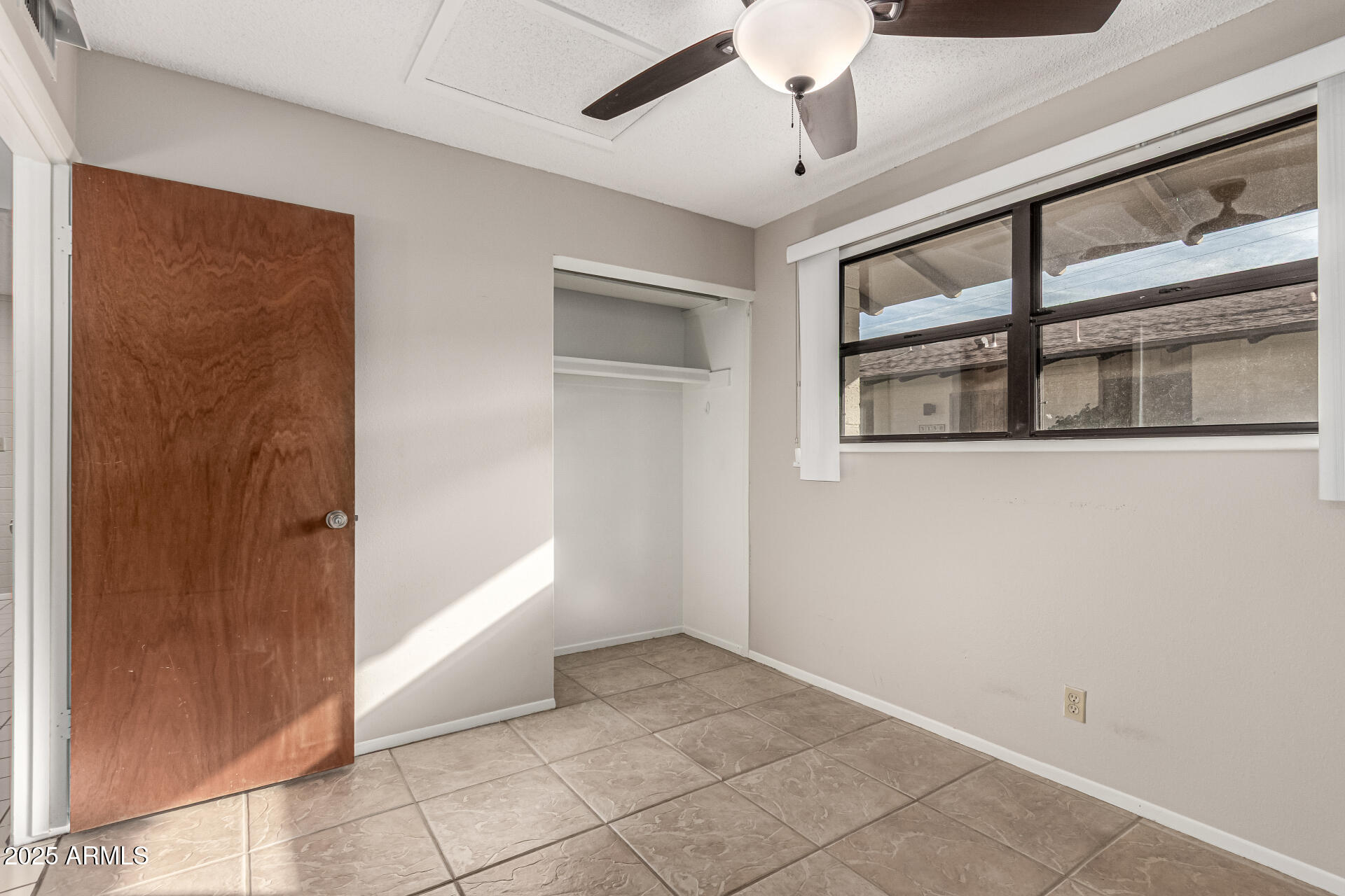 6721 East McDowell Road, Unit B314 Scottsdale, AZ 85257 - Photo 16 of 31 an empty room with windows