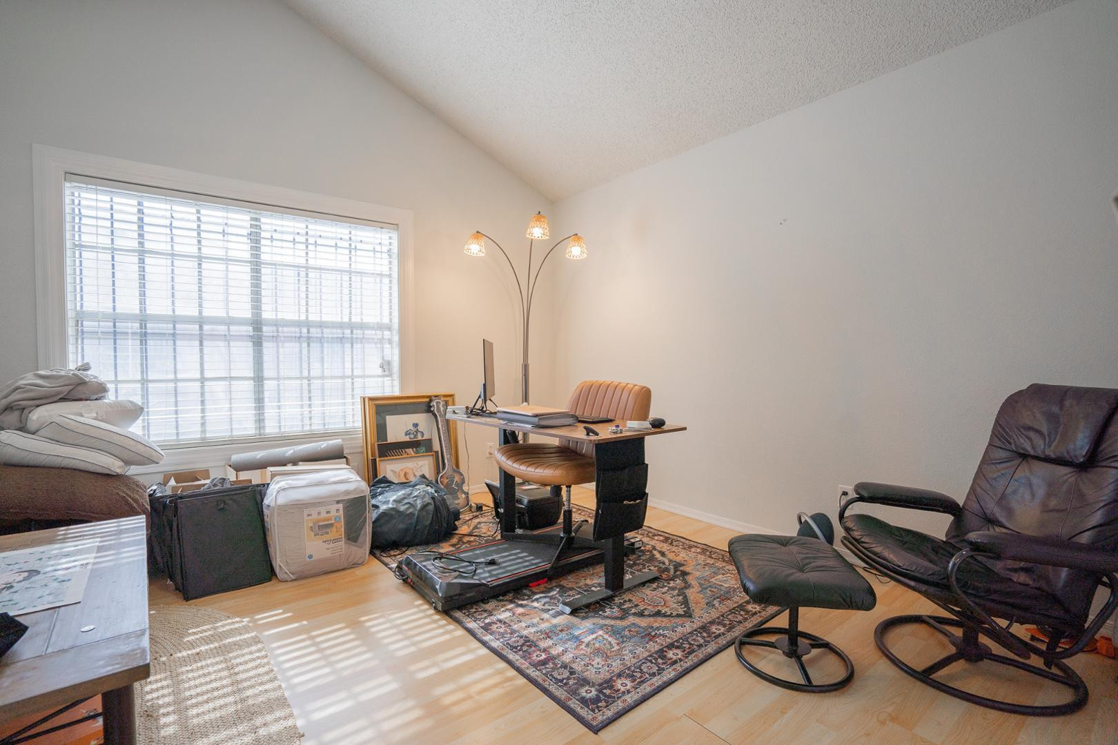 8111 West Wacker Road, Unit 70 Peoria, AZ 85381 - Photo 16 of 38 a view of a workspace with furniture and a window