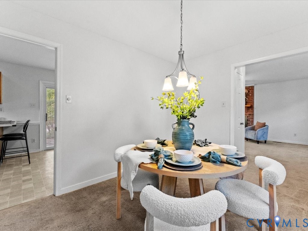 5216 Reids Pointe Road Glen Allen, VA 23060 - Photo 16 of 38 Dining area featuring light colored carpet and bas
