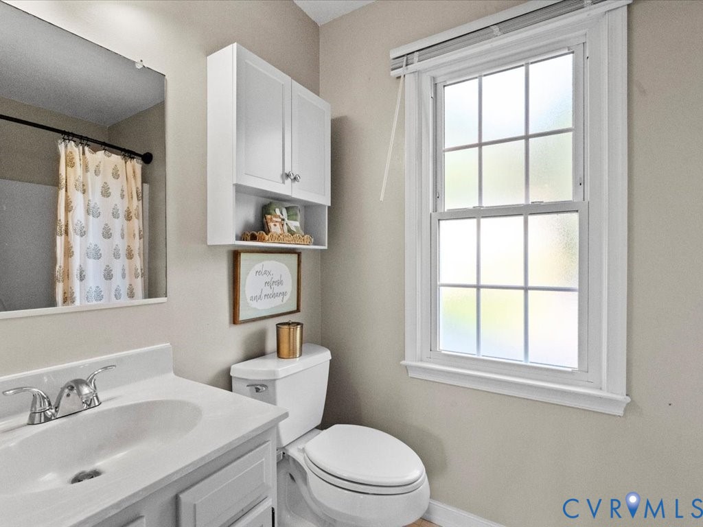 5216 Reids Pointe Road Glen Allen, VA 23060 - Photo 27 of 38 Bathroom with healthy amount of natural light, van