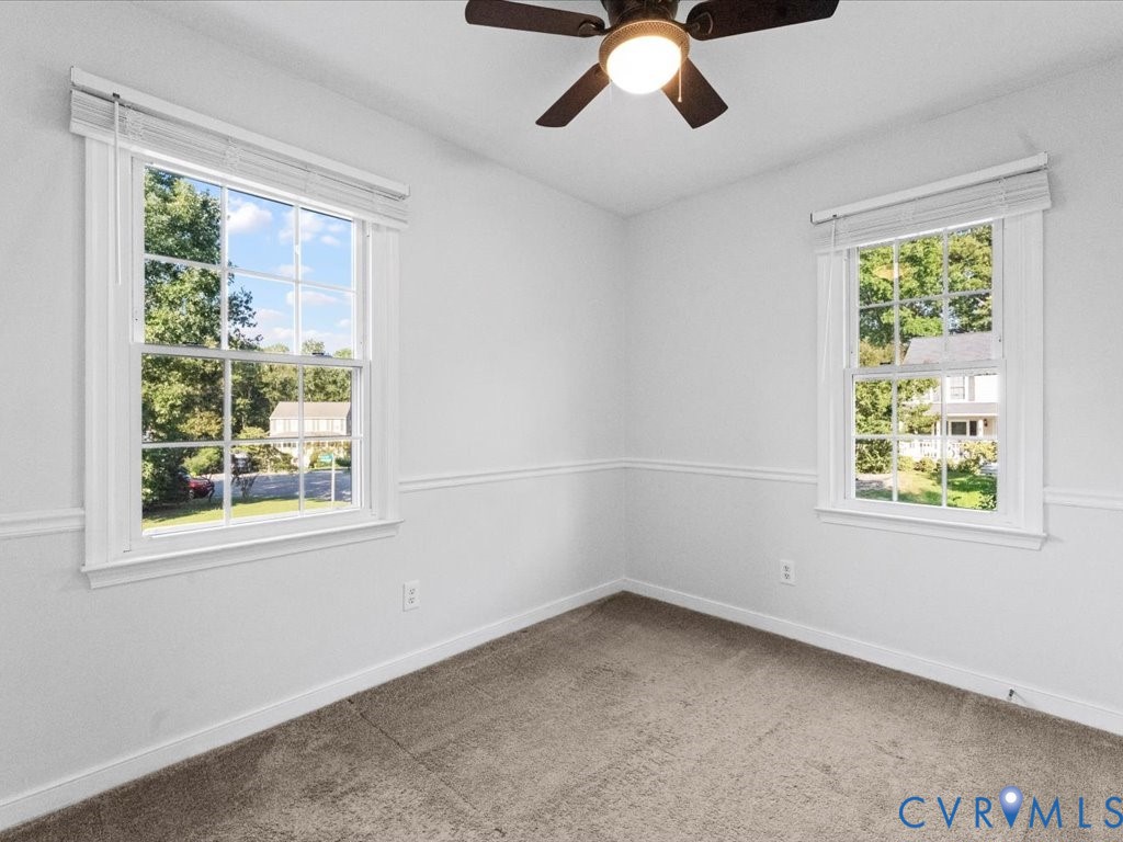 5216 Reids Pointe Road Glen Allen, VA 23060 - Photo 31 of 38 Carpeted spare room with baseboards and a ceiling