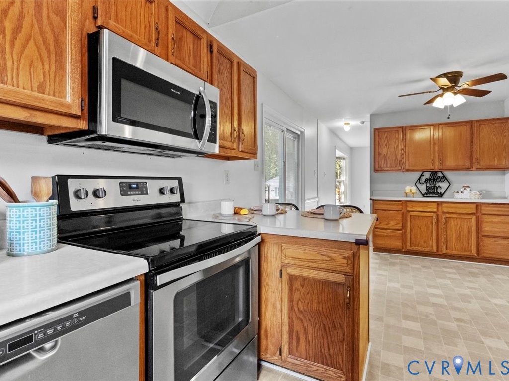 5216 Reids Pointe Road Glen Allen, VA 23060 - Photo 9 of 38 Kitchen with stainless steel appliances, light cou