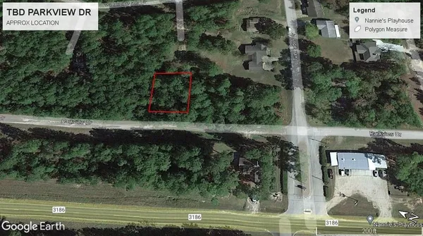 an aerial view of a houses with outdoor space