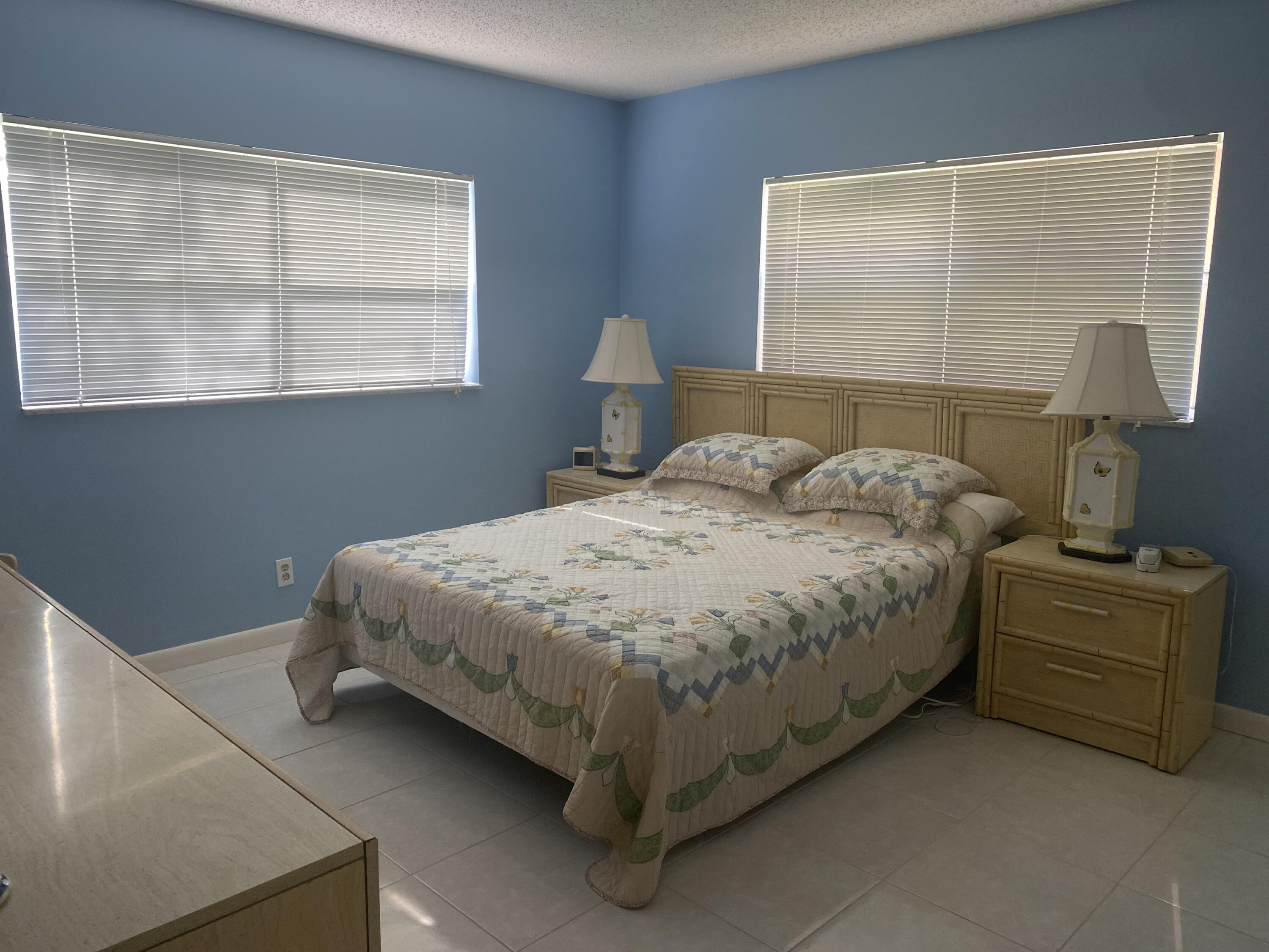 8826 West McNab Road, Unit 101 Tamarac, FL 33321 - Photo 4 of 13 Master bedroom