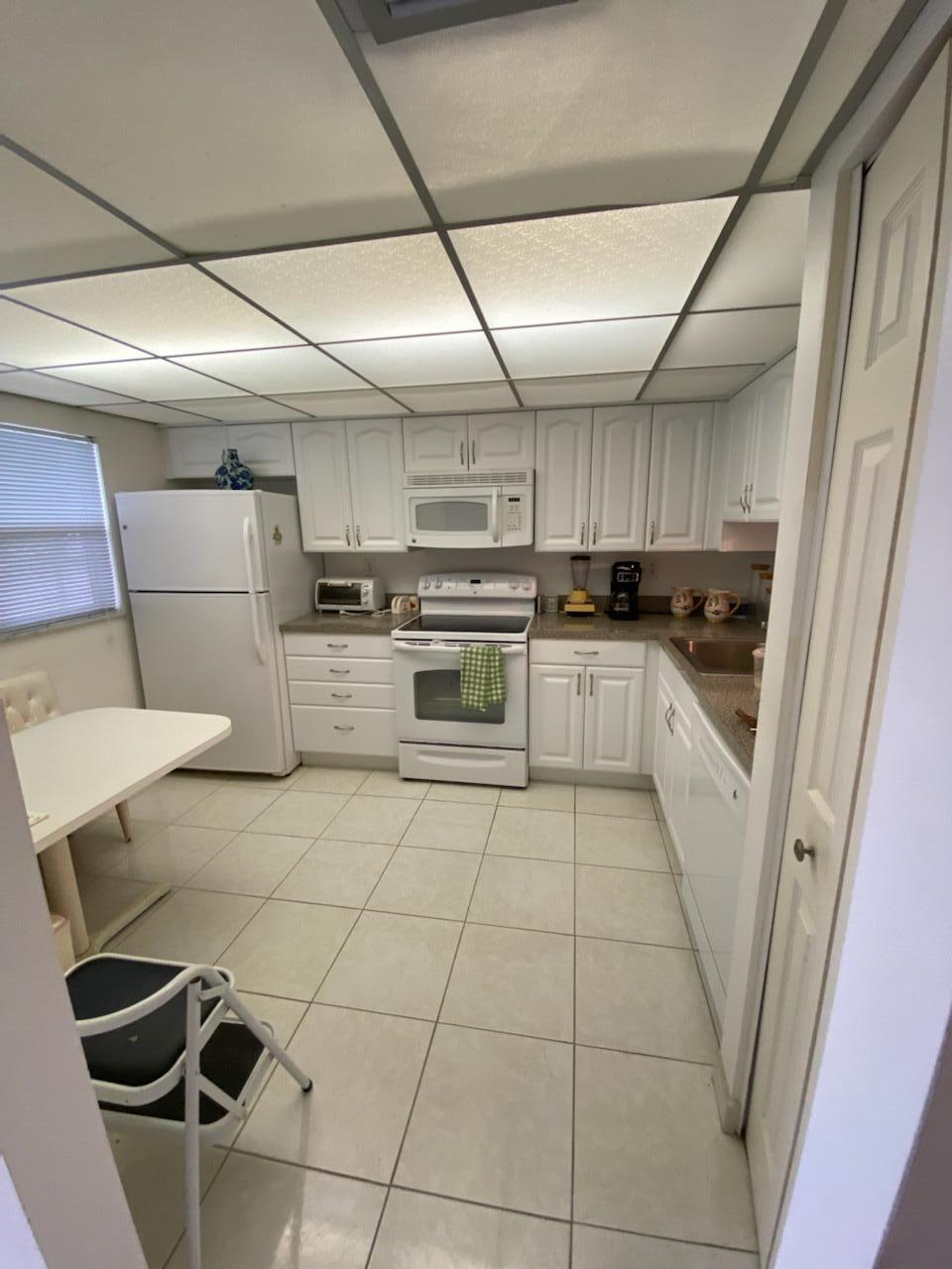 8826 West McNab Road, Unit 101 Tamarac, FL 33321 - Photo 7 of 13 Kitchen 1
