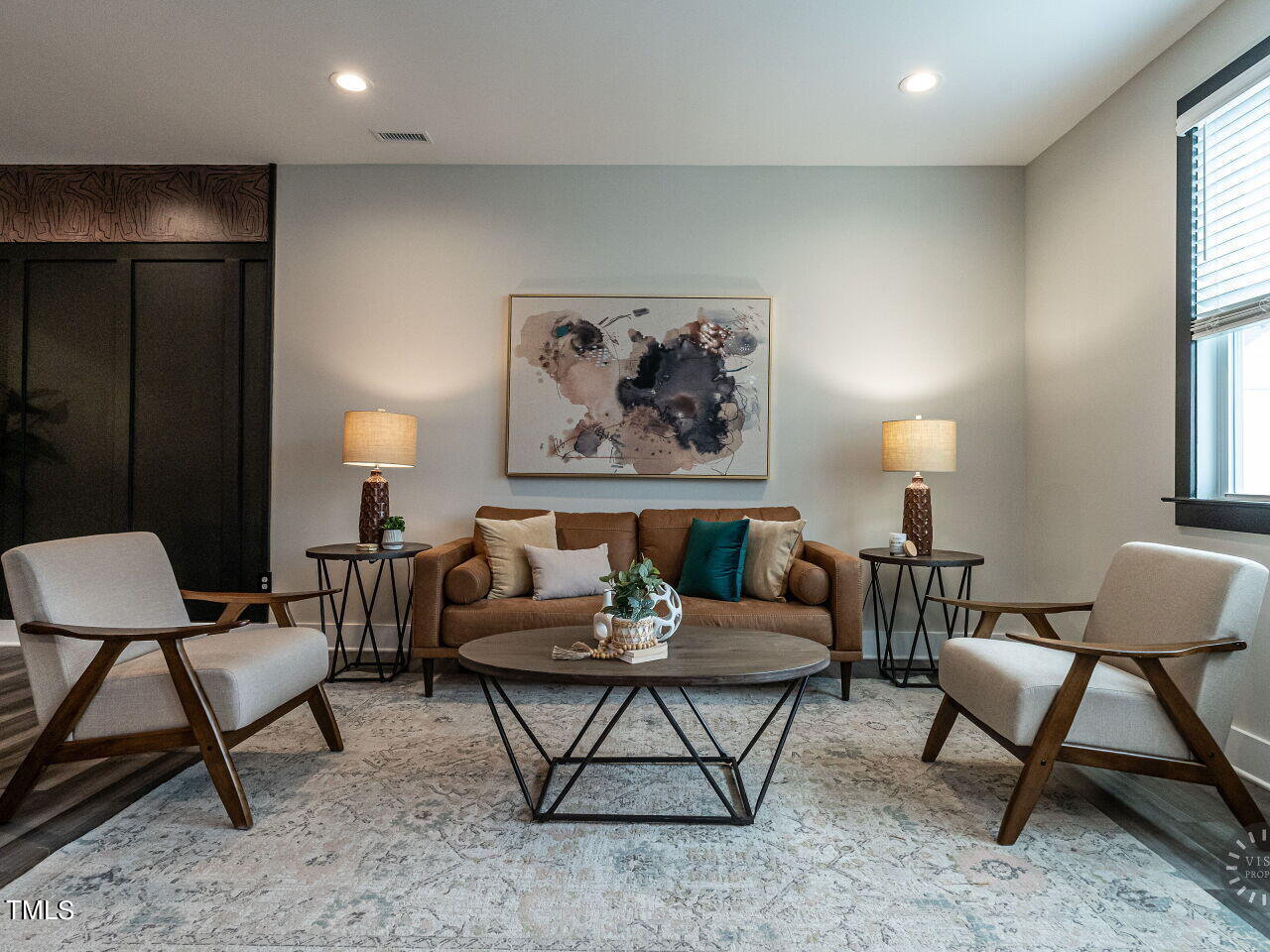 806 Malta Way Durham, NC 27703 - Photo 13 of 37 a living room with furniture and a rug
