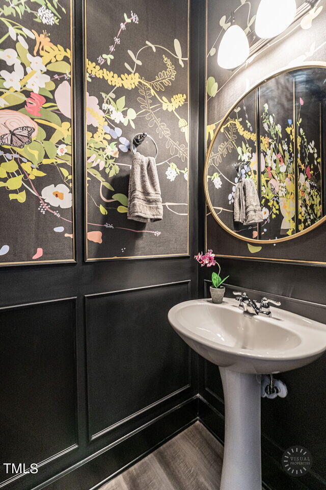 806 Malta Way Durham, NC 27703 - Photo 17 of 37 a bathroom with a sink and a mirror