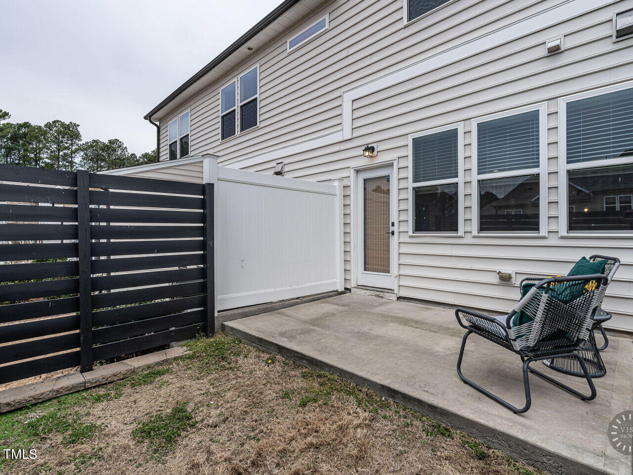 806 Malta Way Durham, NC 27703 - Photo 28 of 37 a view of a house with backyard and sitting area