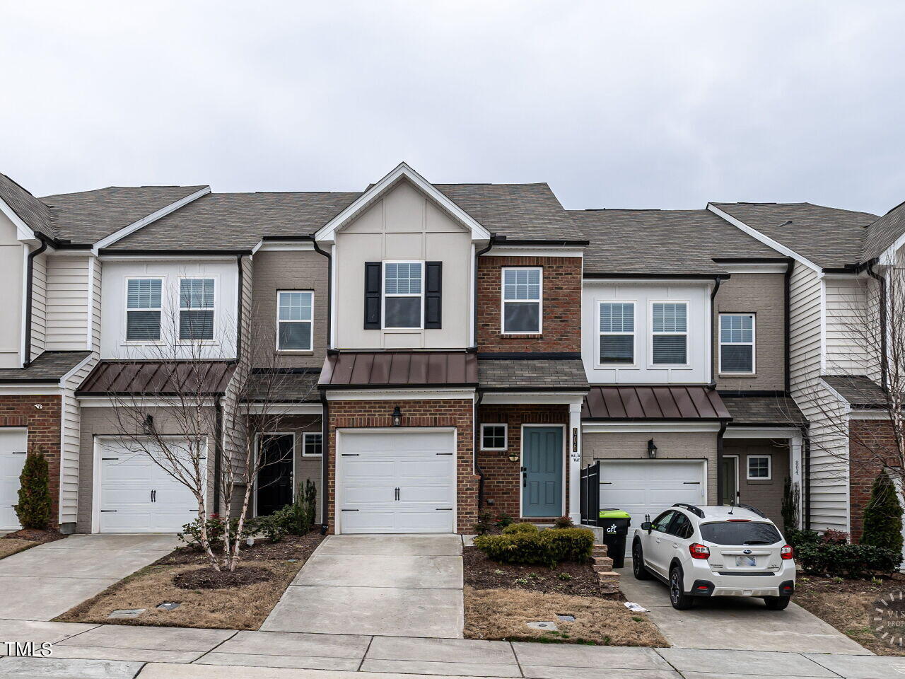 806 Malta Way Durham, NC 27703 - Photo 29 of 37 a front view of a house with parking space