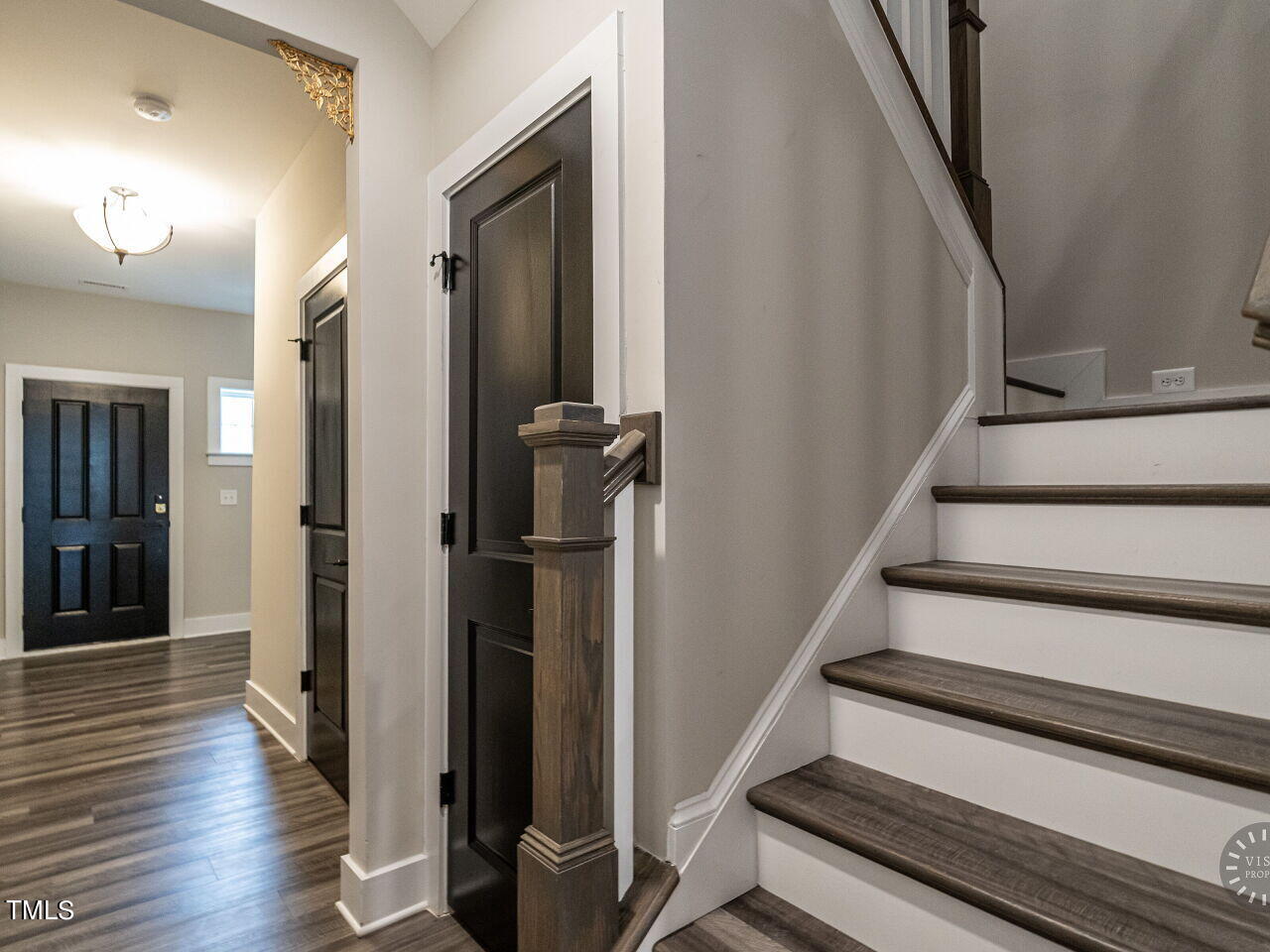 806 Malta Way Durham, NC 27703 - Photo 4 of 37 a view of entryway with wooden floor and stairs