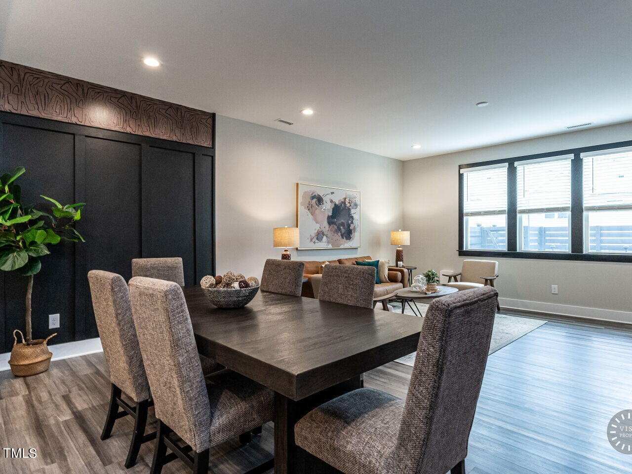 806 Malta Way Durham, NC 27703 - Photo 10 of 37 a view of a dining room with furniture window and wooden floor
