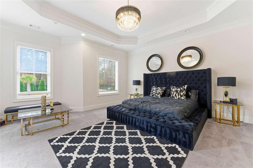 1616 Palmilla Way Southwest Stockbridge, GA 30281 - Photo 20 of 50 a bedroom with a bed and a window