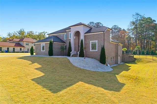 a view of a house with a swimming pool