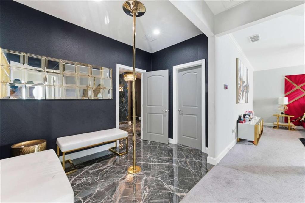 1616 Palmilla Way Southwest Stockbridge, GA 30281 - Photo 31 of 50 a living room with furniture