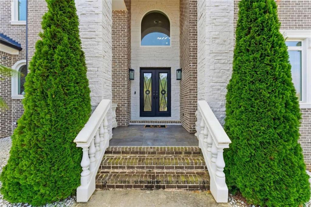 1616 Palmilla Way Southwest Stockbridge, GA 30281 - Photo 4 of 50 an outdoor view of house with green space