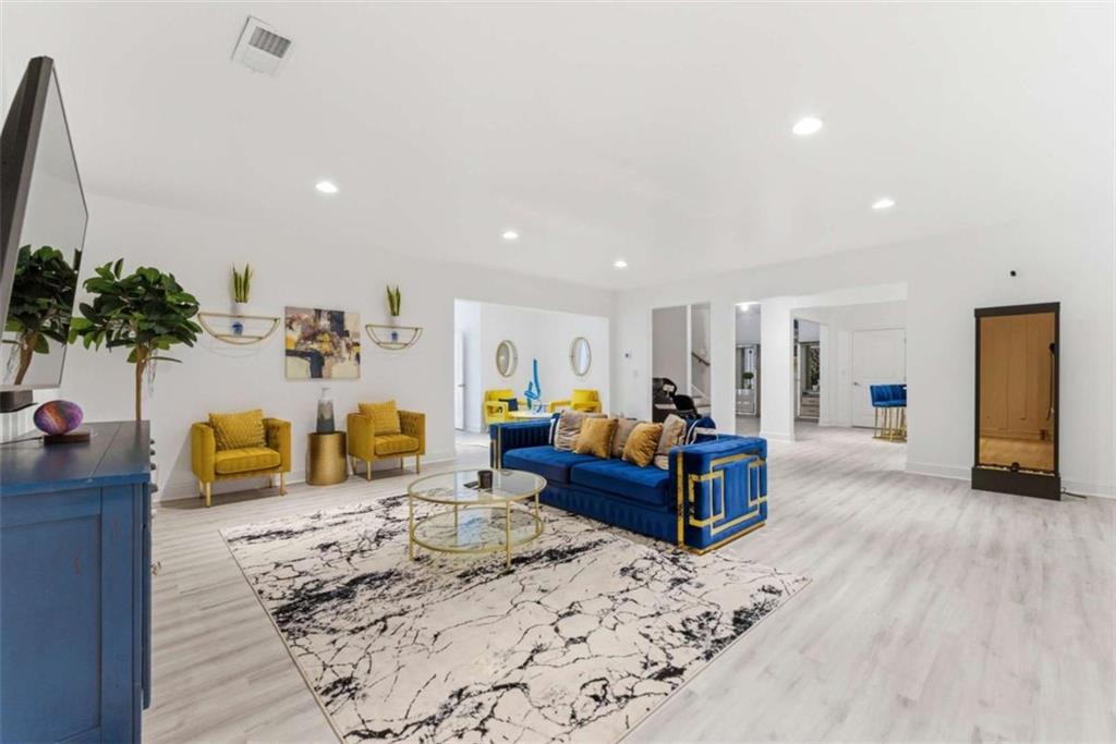 1616 Palmilla Way Southwest Stockbridge, GA 30281 - Photo 42 of 50 a living room with furniture and a couch