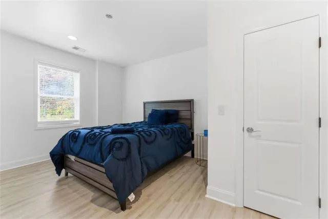 a view of a terrace with wooden floor and outdoor seating