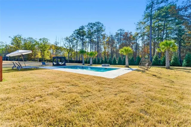 a view of a playground with basketball court