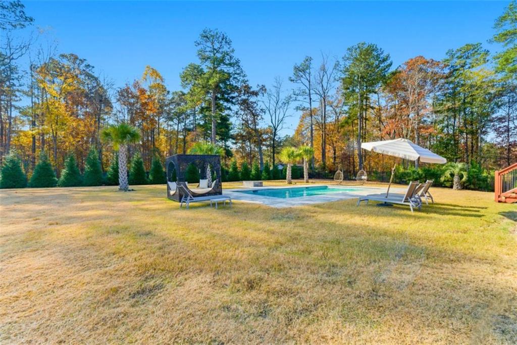 1616 Palmilla Way Southwest Stockbridge, GA 30281 - Photo 49 of 50 a view of a playground with basketball court