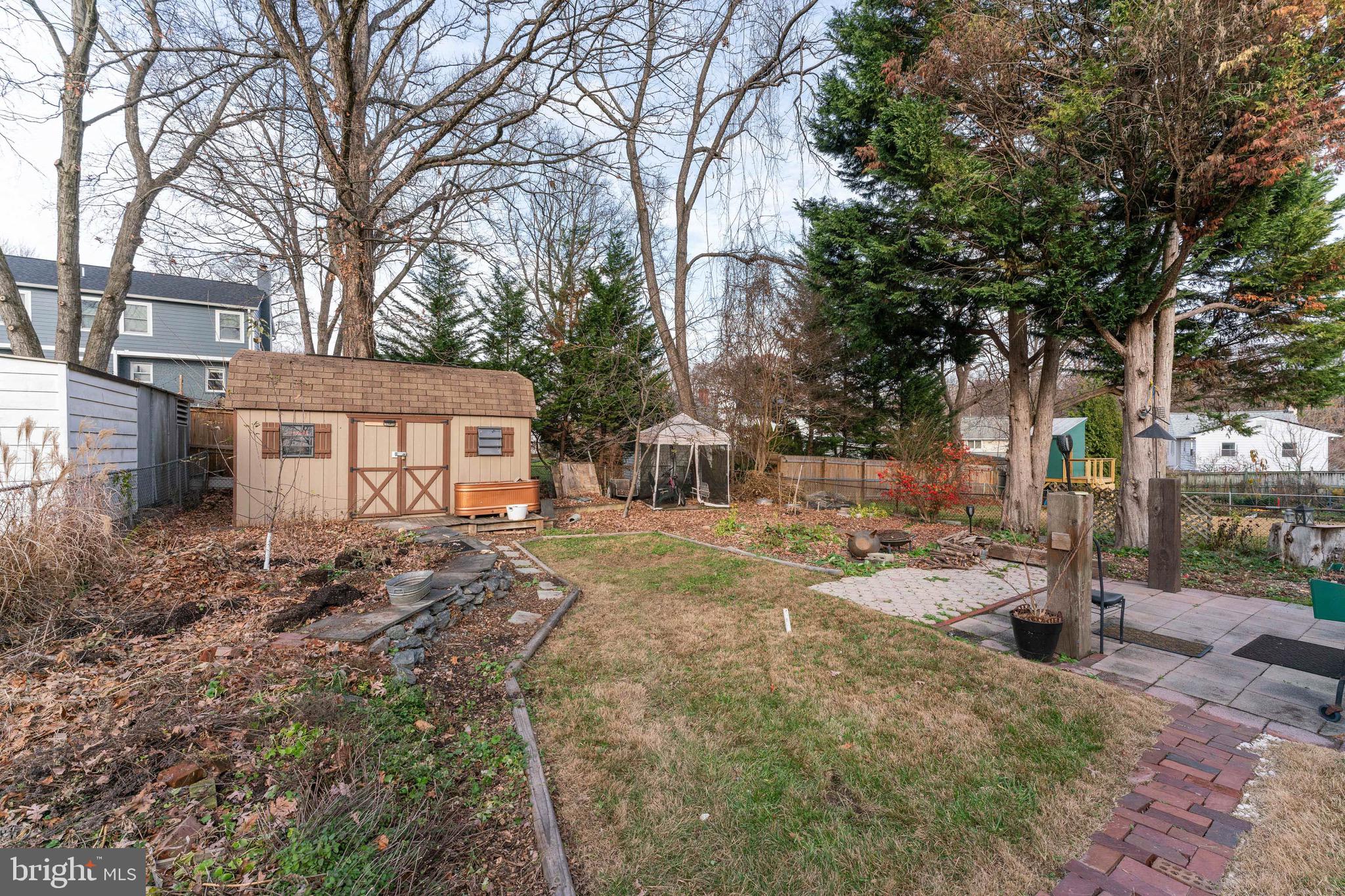 1609 Brisbane Street Silver Spring, MD 20902 - Photo 13 of 25 a view of a house with yard and a tree