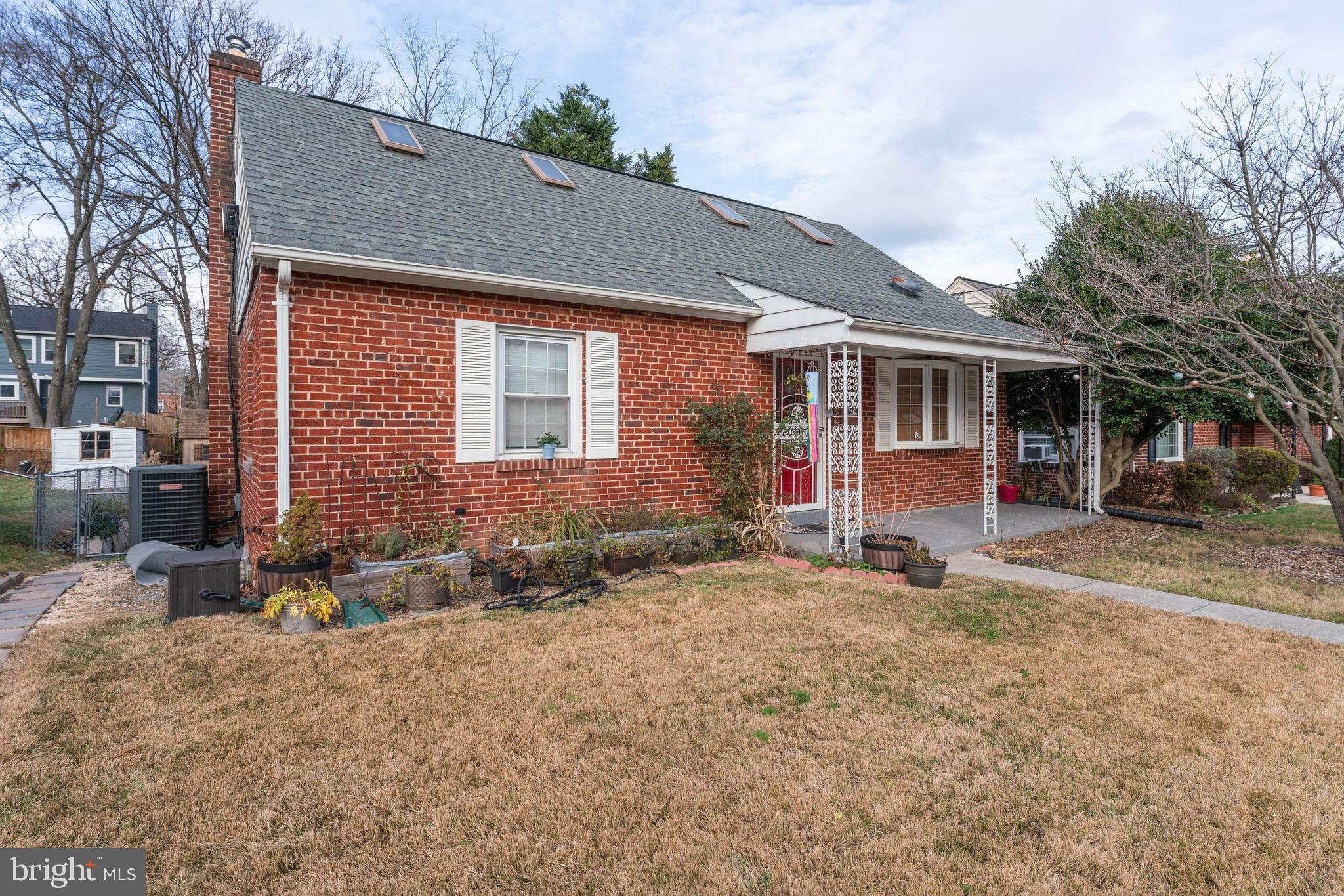 1609 Brisbane Street Silver Spring, MD 20902 - Photo 2 of 25 a backyard of a house with seating space