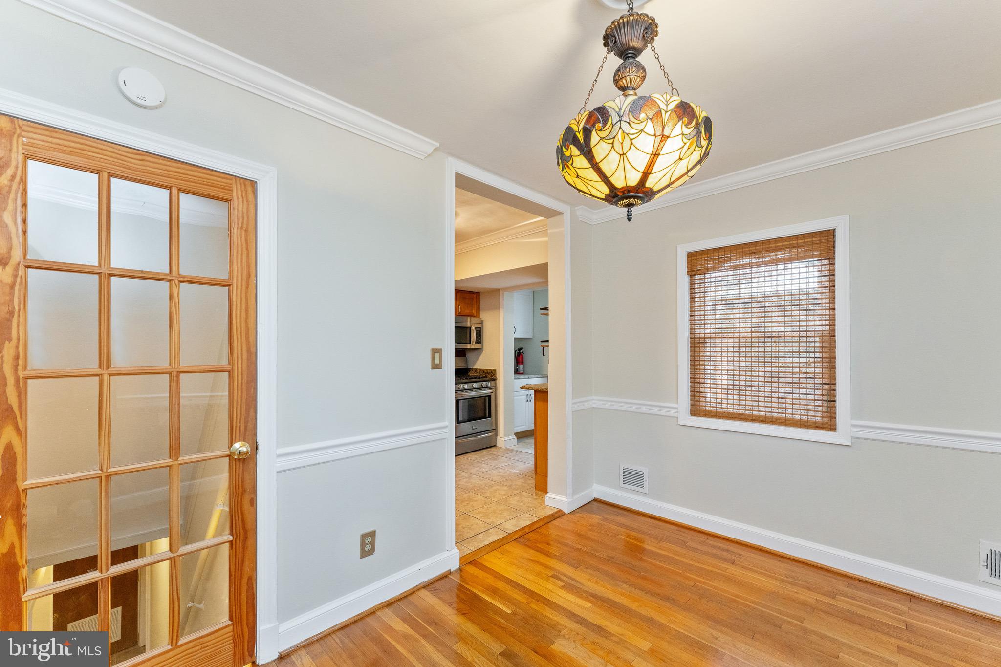 1609 Brisbane Street Silver Spring, MD 20902 - Photo 10 of 25 a view of an empty room with a window
