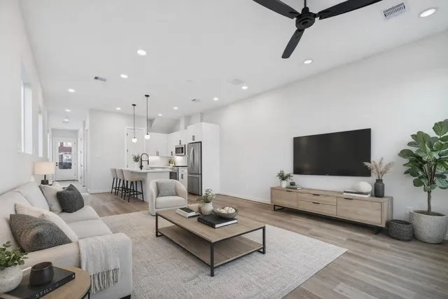 a view of hallway with wooden floor
