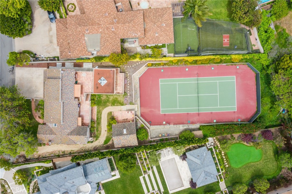 an outdoor space with furniture and garden