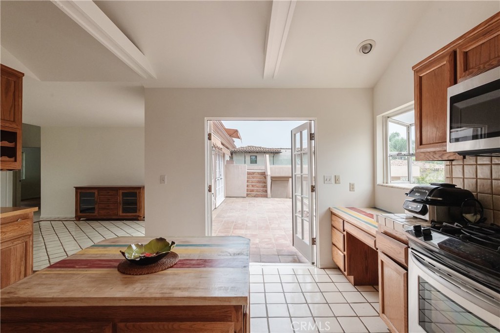 1166 Longfellow Drive Manhattan Beach, CA 90266 - Photo 15 of 47 a kitchen with a sink appliances and cabinets
