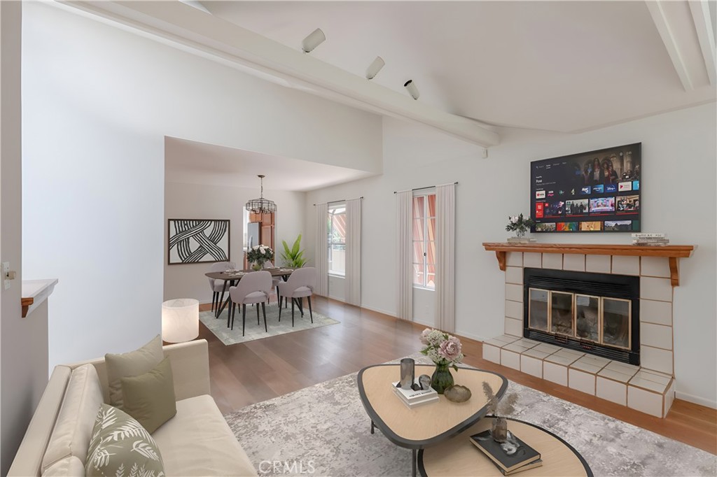 1166 Longfellow Drive Manhattan Beach, CA 90266 - Photo 17 of 47 a living room with furniture and a fireplace