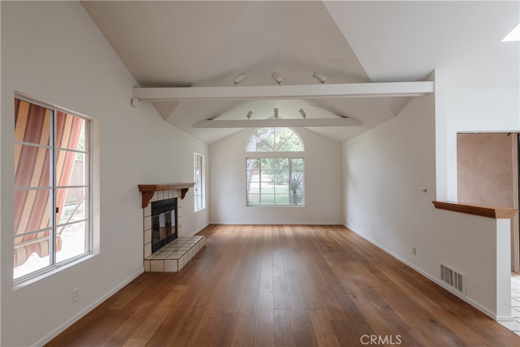 1166 Longfellow Drive Manhattan Beach, CA 90266 - Photo 20 of 47 wooden floor in an empty room with a window