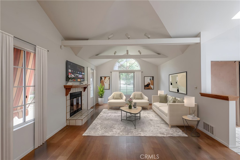 1166 Longfellow Drive Manhattan Beach, CA 90266 - Photo 21 of 47 a living room with furniture and a fireplace