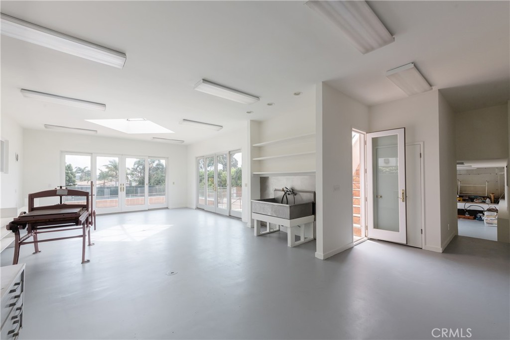 1166 Longfellow Drive Manhattan Beach, CA 90266 - Photo 30 of 47 a view of a livingroom with furniture and floor to ceiling window